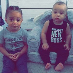 My 2 bundles of joy!🙂 my youngest in the chair is modeling the item for sell.